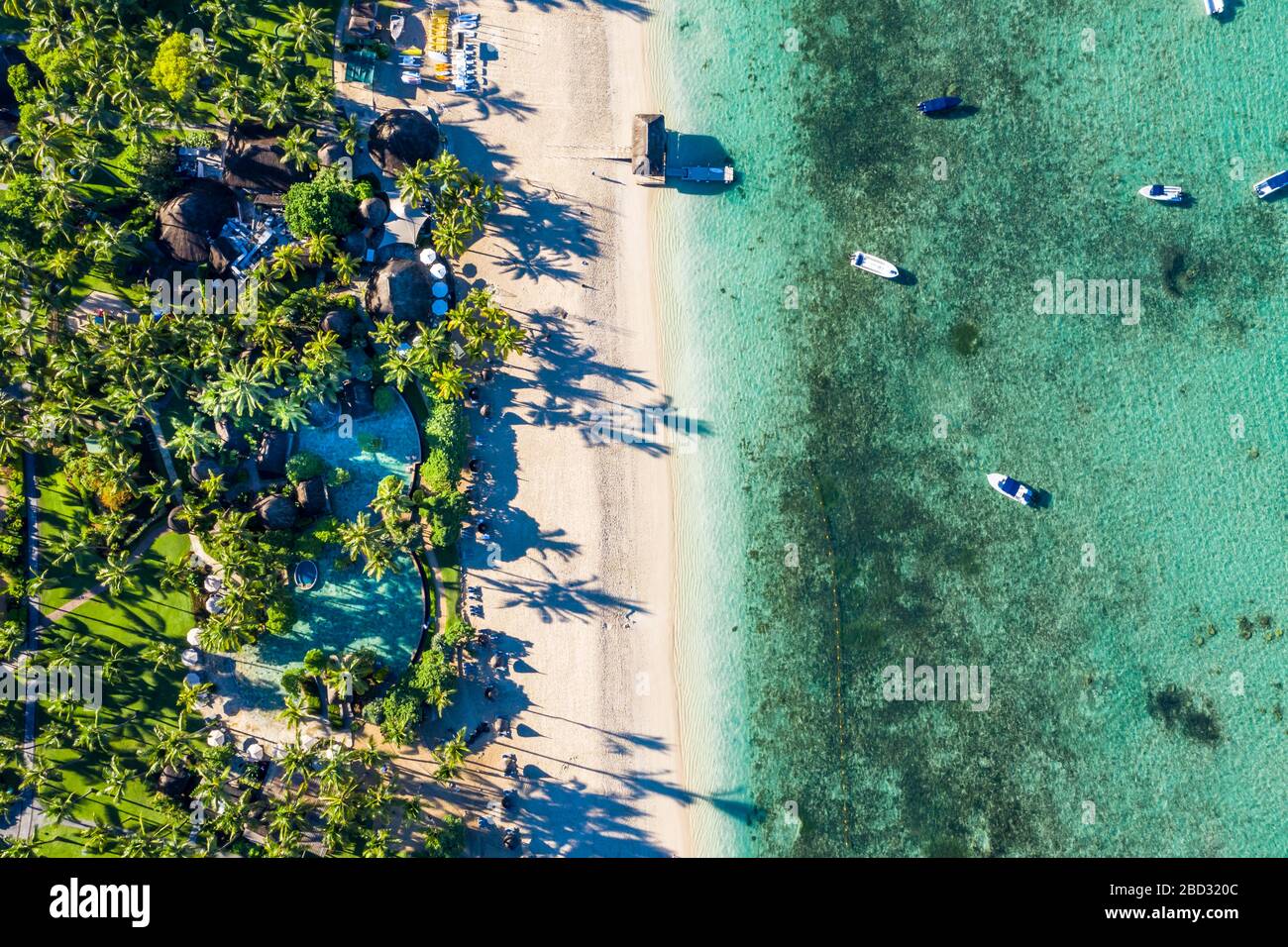 Aerial view, Idyllic palm beach, luxury hotel La Pirogue Resort & Spa, Flic en Flac, Mauritius Stock Photo