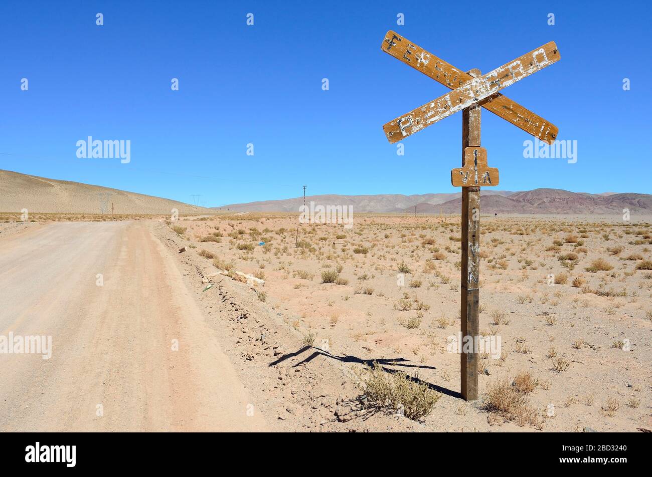 Weathered sign level crossing, Laguna Seca, Ruta 27, Puna, Salta Province, Argentina Stock Photo