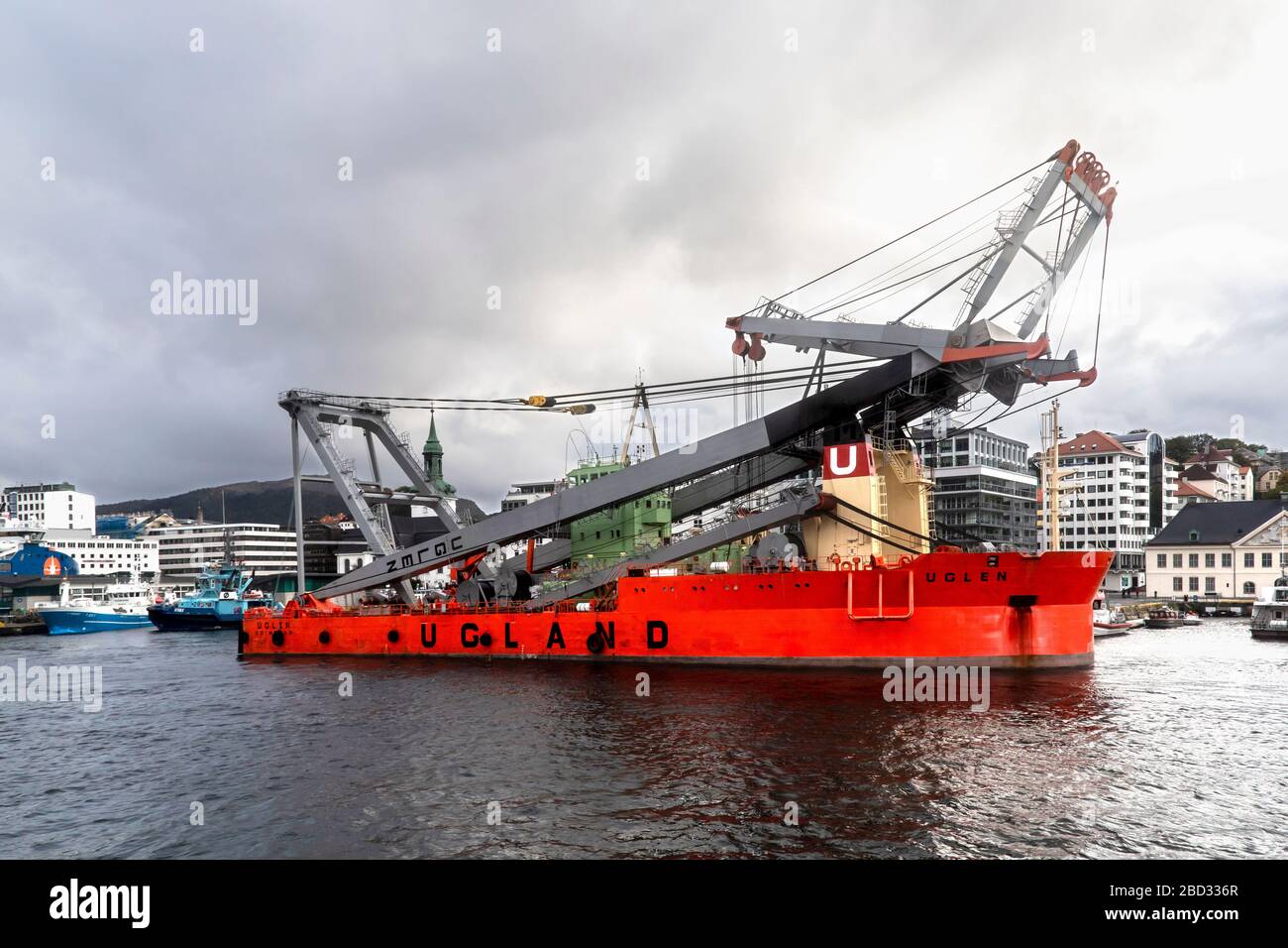 Heavy lift crane vessel Uglen moored in port of Bergen, Norway. A rainy and  rainy day Stock Photo - Alamy