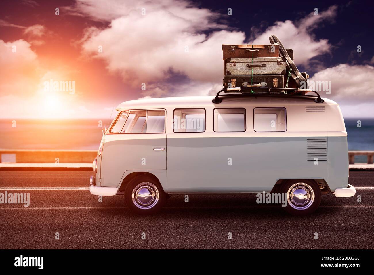 Classic Blue and white VW Camper Van parked on Seafront Promenade. Stock Photo