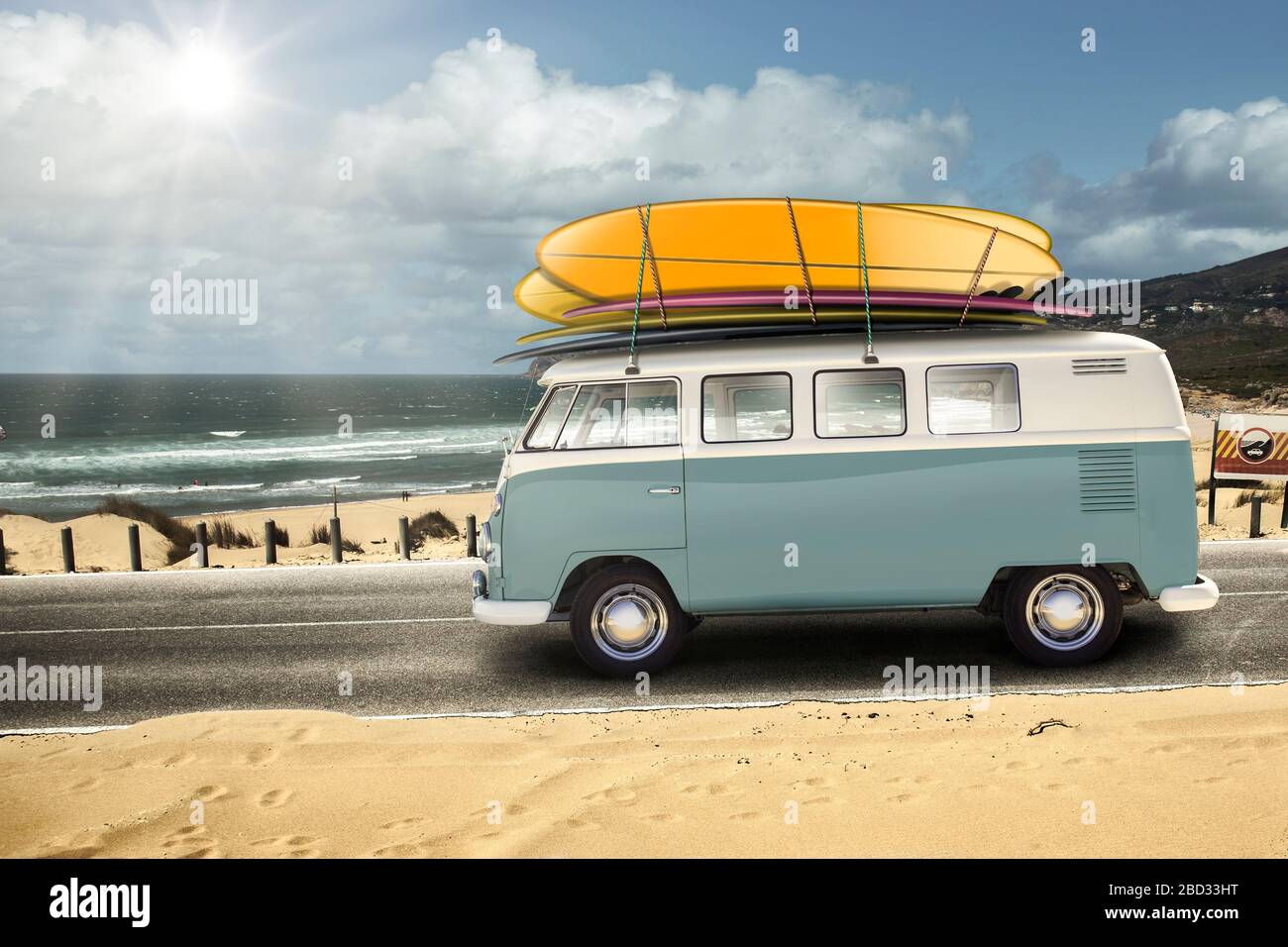 Classic Blue and white VW Camper Van parked on Seafront Promenade. Stock Photo