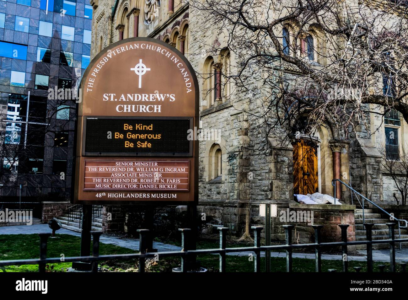 St Andrew's church in downtown Toronto with message on sign amid the coronavirus pandemic Stock Photo
