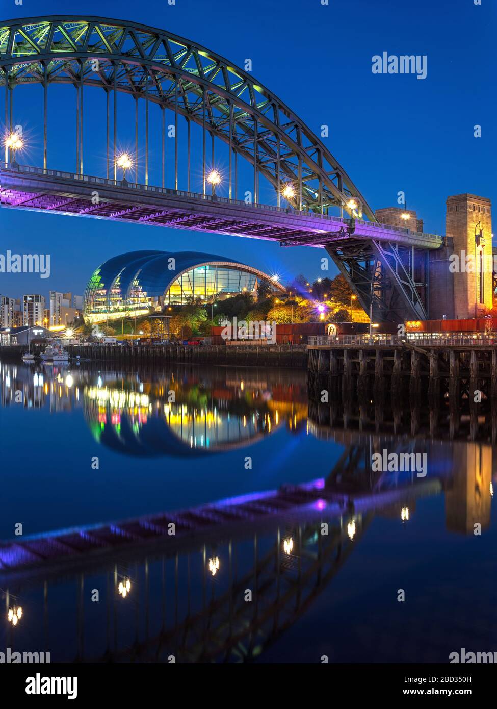 The Tyne Bridge & Sage Gateshead at night from Newcastle quayside, Newcastle upon Tyne, Tyne and Wear, England, United Kingdom Stock Photo