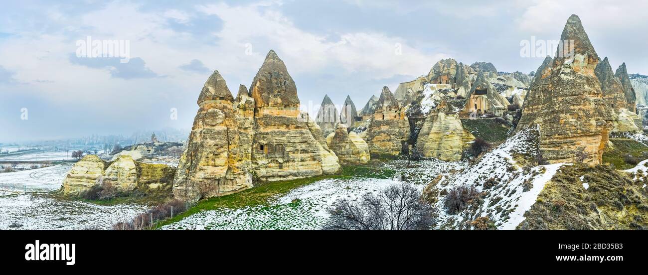 Panorama of ancinet housing, cut in huge Cappadocian rocks and preserved to the present time, Turkey Stock Photo