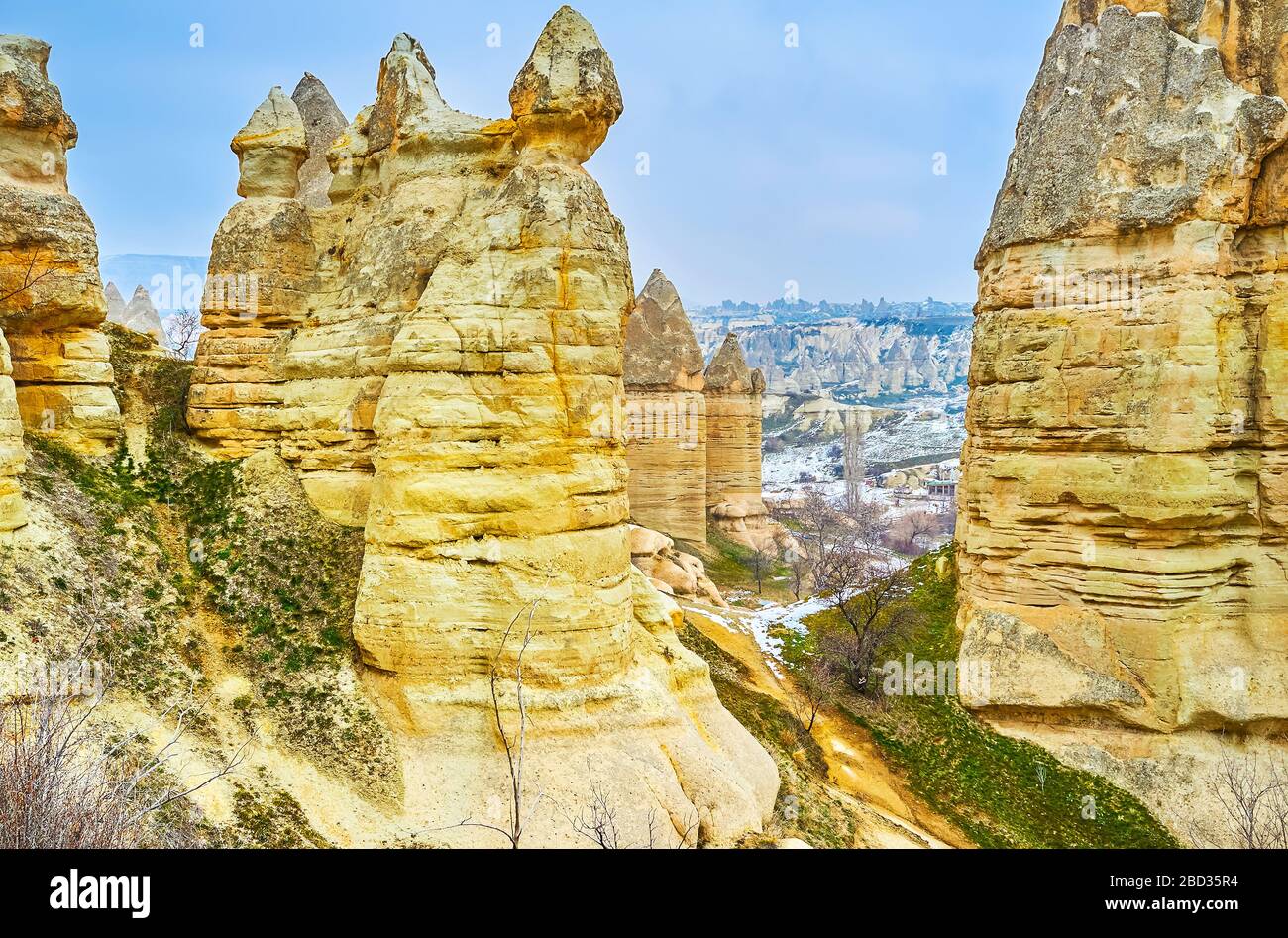 The mountain landscape of Goreme with stunning weathered fairy chimney ...