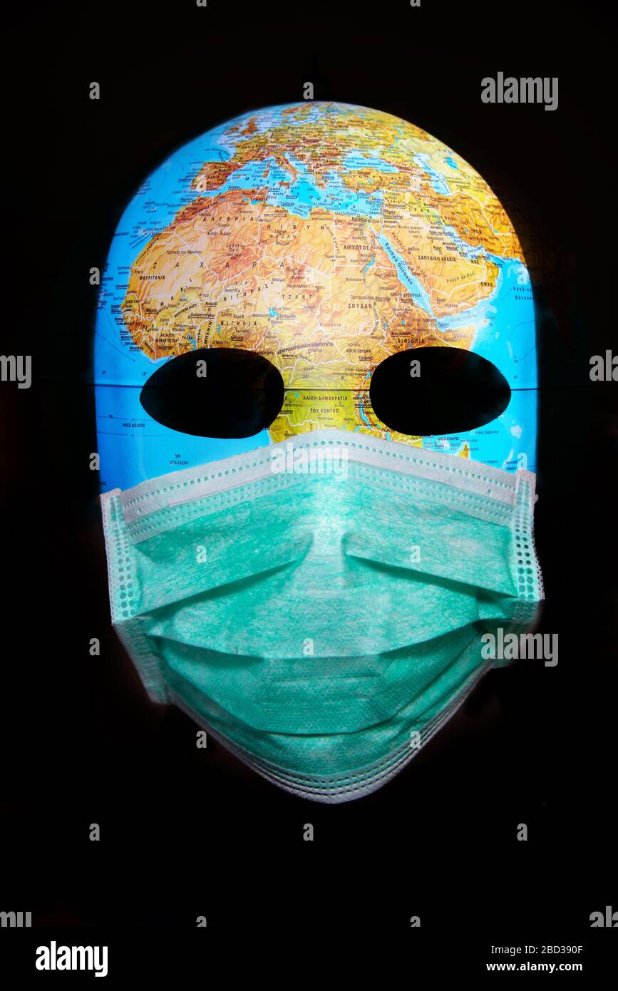 Textured mask with the map of Africa wearing surgical mask. Concept for corona virus pandemia. Stock Photo
