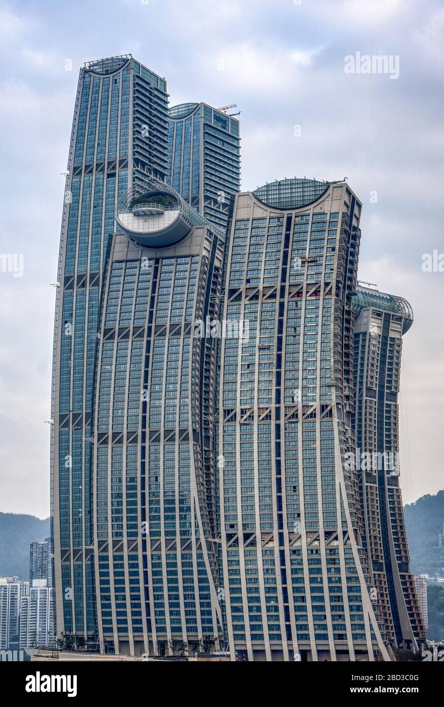 Chongqing, China - Dec 22, 2019: Ascott Raffles City hotel buidling with crystal skybridge on the top Stock Photo