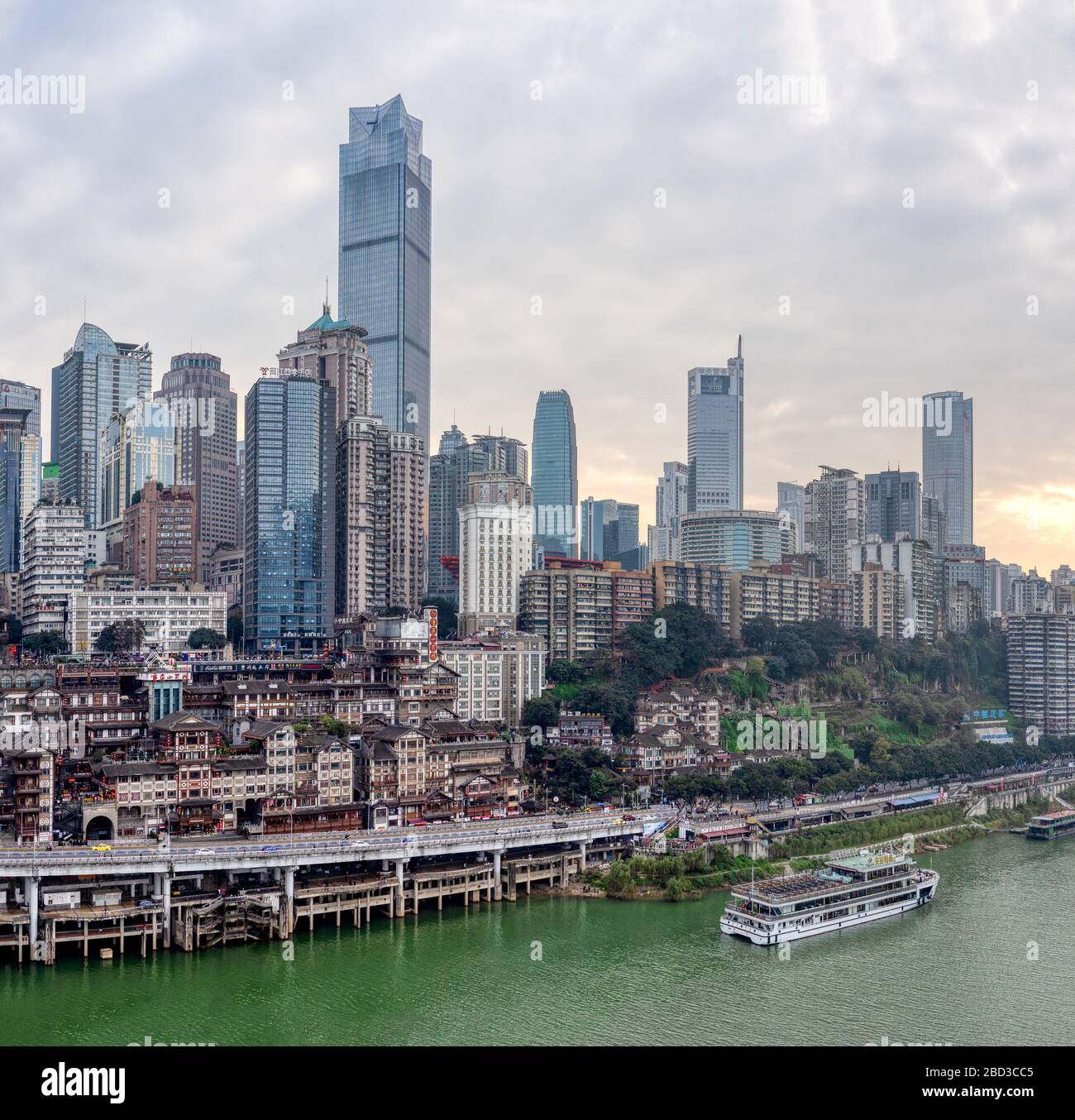 Chongqing, China - Dec 22, 2019: CBD Skyscrapers near Hongya dong cave by Jialing river Stock Photo