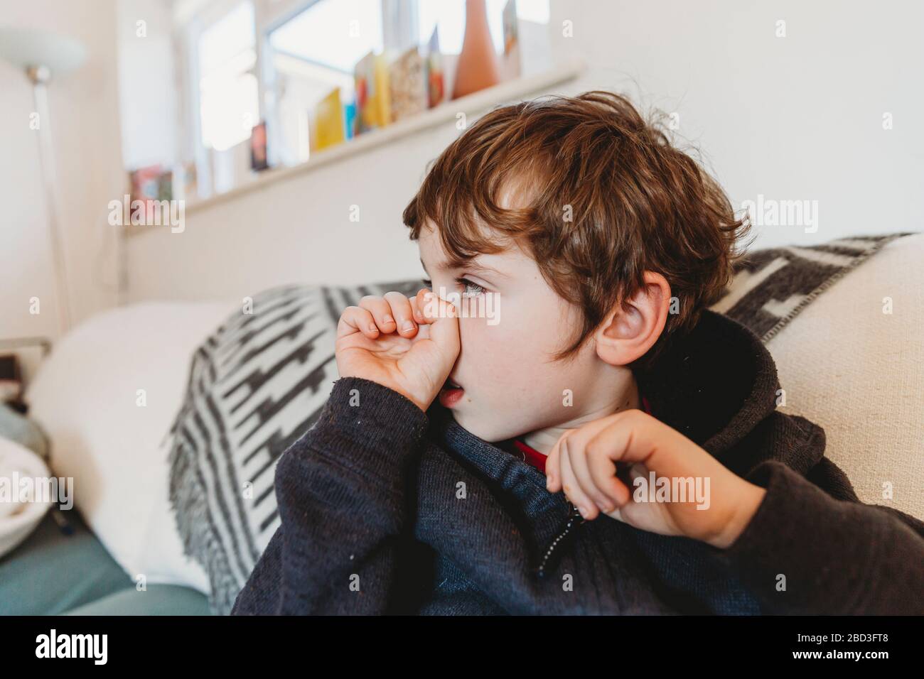 Child holding nose hires stock photography and images Alamy