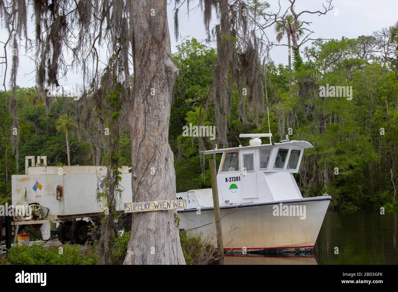 A vintage commercial fishing boat on the Withlacoochee River at Yankeetown, Florida Stock Photo