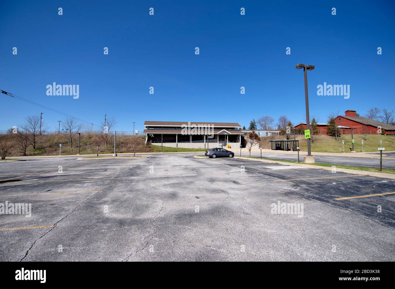La Fox, Illinois, USA. A virtually empty commuter parking lot underscores the impact of coronavirus pandemic in the United States. Stock Photo
