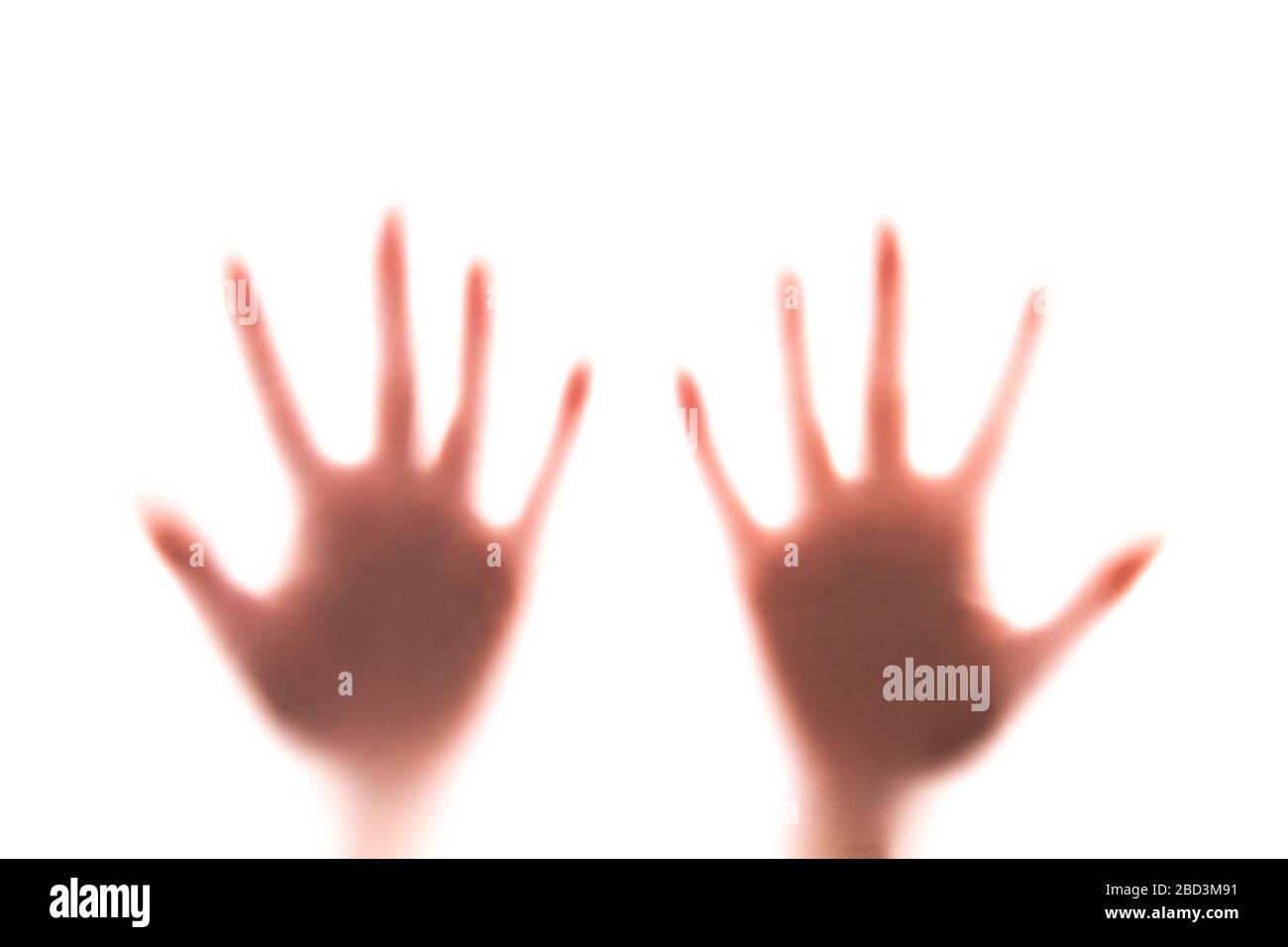 Two blurred hands isolated on white background. Danger can be on hands. Coronavirus concept. Stock Photo