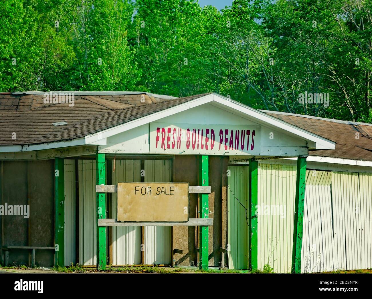 An abandoned store advertises fresh boiled peanuts, March 29, 2020, in Mobile, Alabama. Boiled peanuts are a popular snack in the American South. Stock Photo
