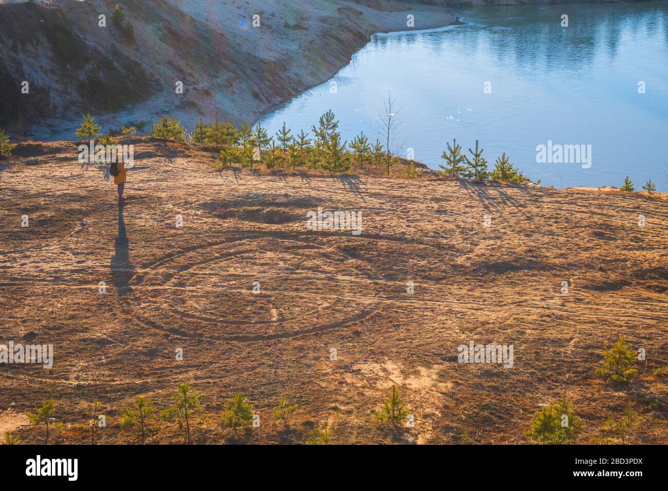 Photographer takes pictures of the sand circles. Stock Photo