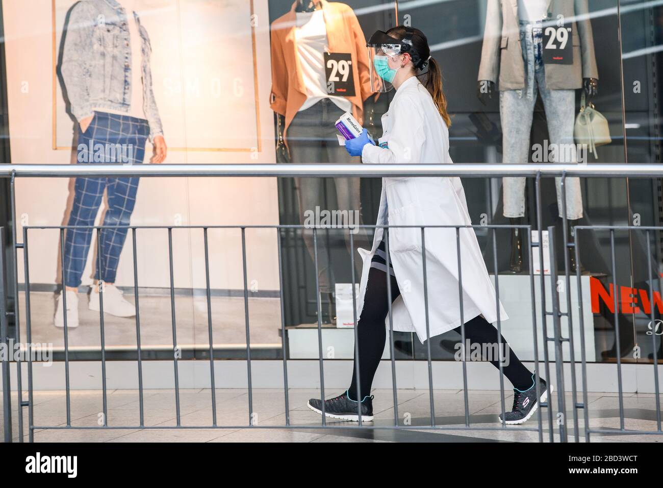 Berlin, Germany. 6th Apr, 2020. A woman wearing a face mask is seen at