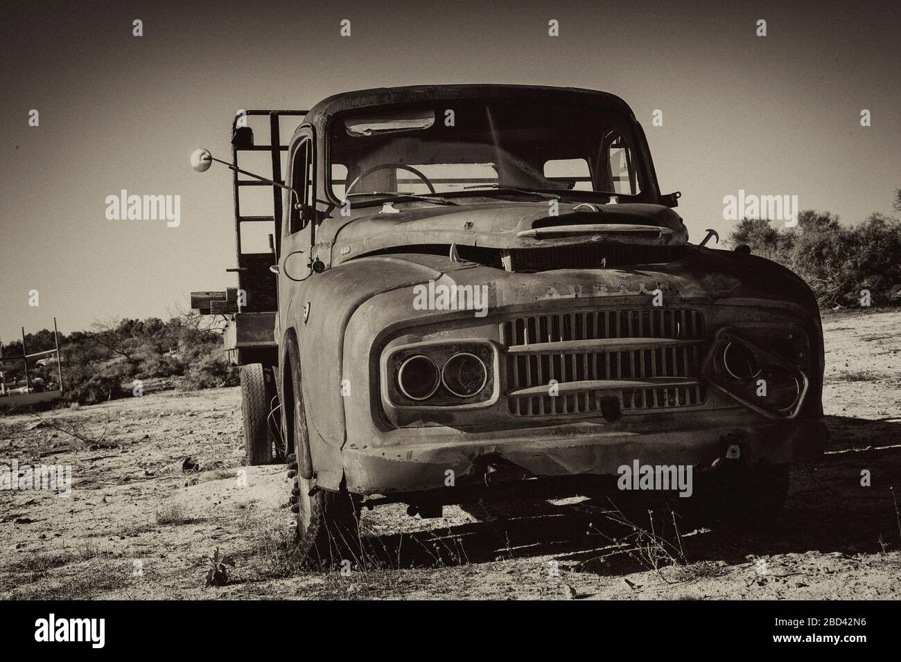 Remnants of a vintage Austin truck abandoned in the Australian Outback Stock Photo