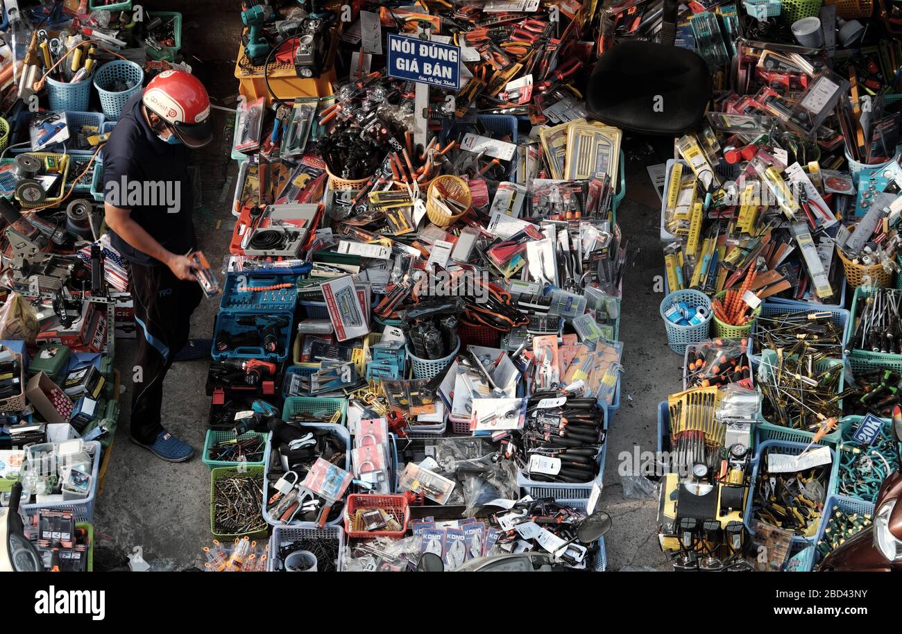 HO CHI MINH CITY, VIET NAM, high view outdoor hand tools, second hand electronic market, many open air shop sell toolkit, machine electronic component Stock Photo
