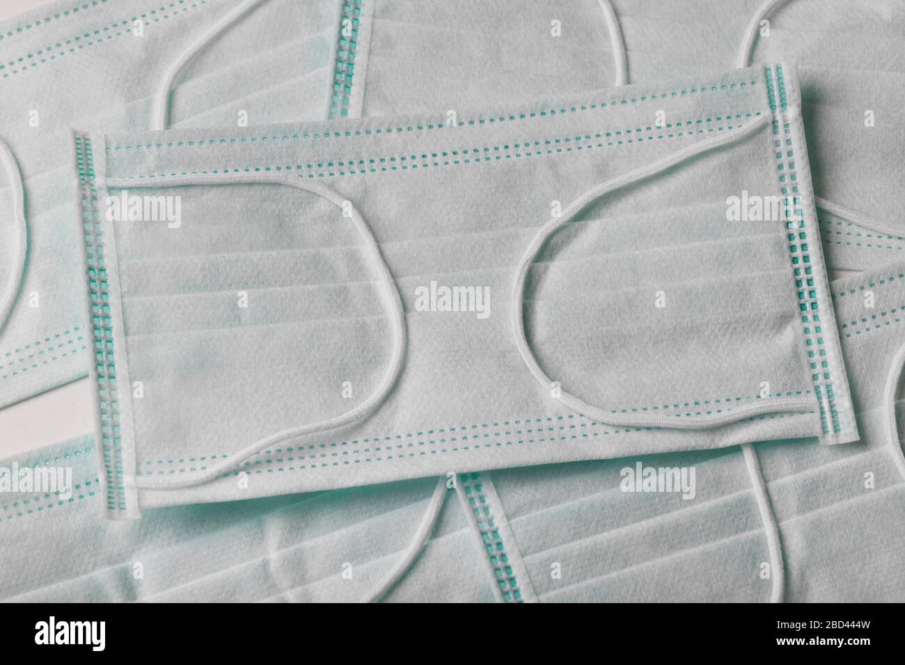 modern surgical face masks background Stock Photo - Alamy