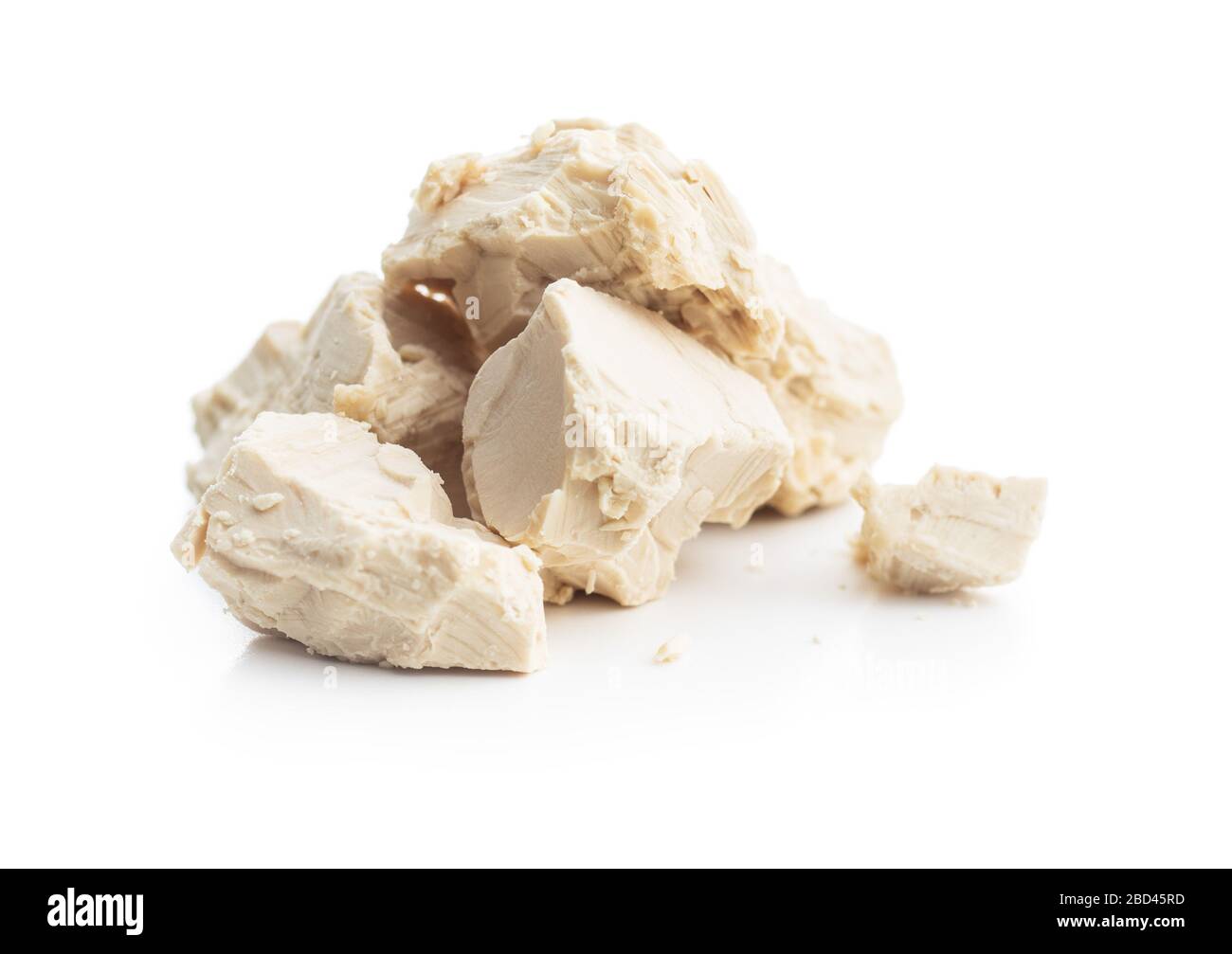 Fresh yeast blocks isolated on white background. Stock Photo