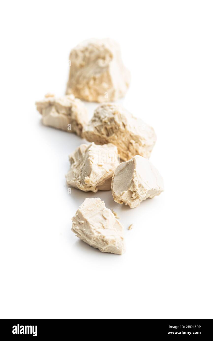 Fresh yeast blocks isolated on white background. Stock Photo