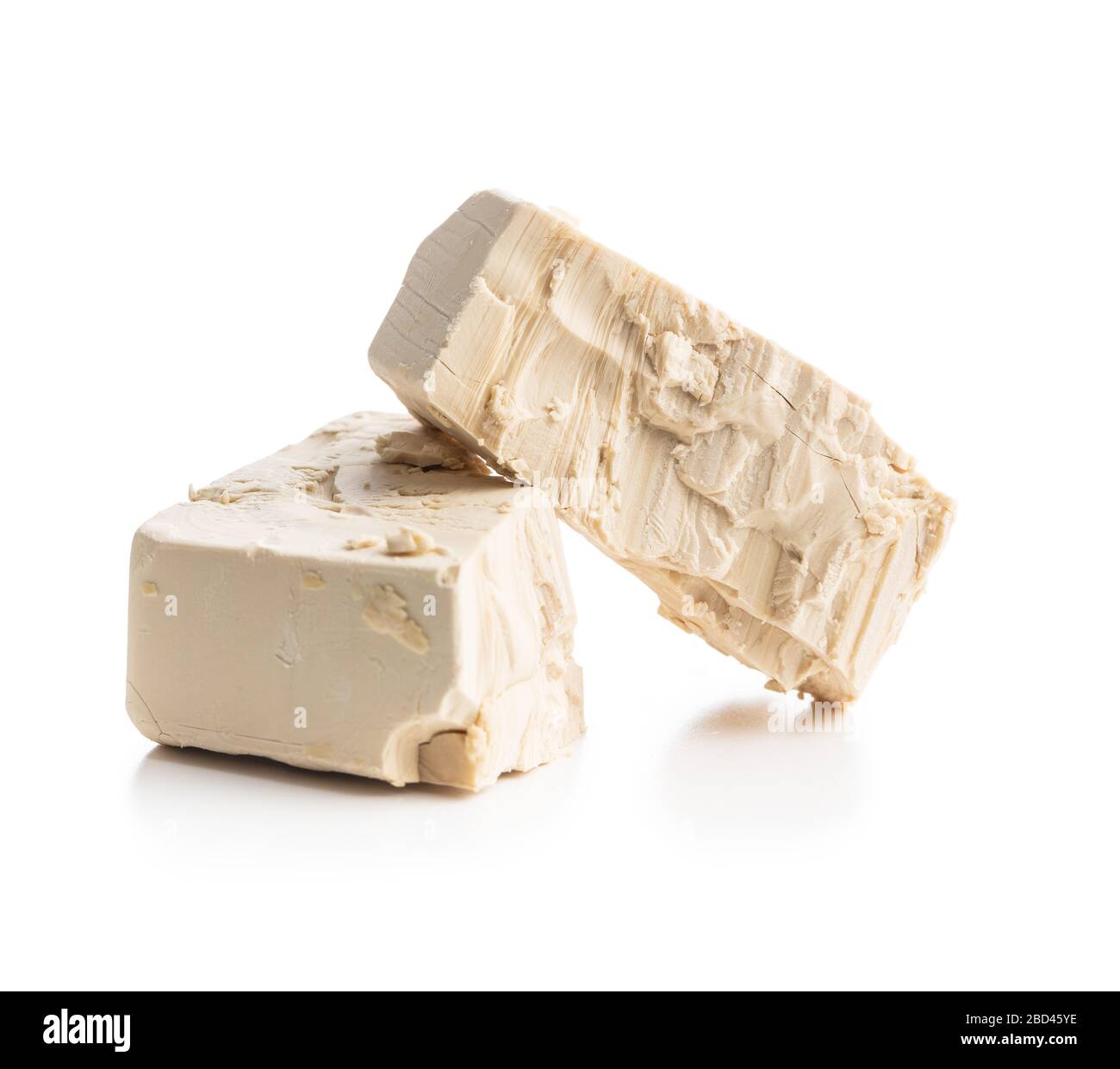 Fresh yeast blocks isolated on white background. Stock Photo