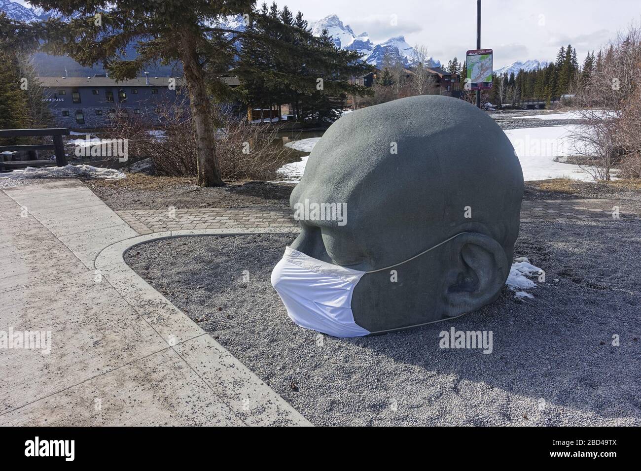 Big Head Sculpture landmark by artist Al Henderson, with white surgical