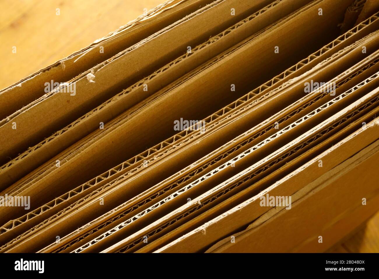 Sheets of brown corrugated cardboard stacked. Packaging material Stock