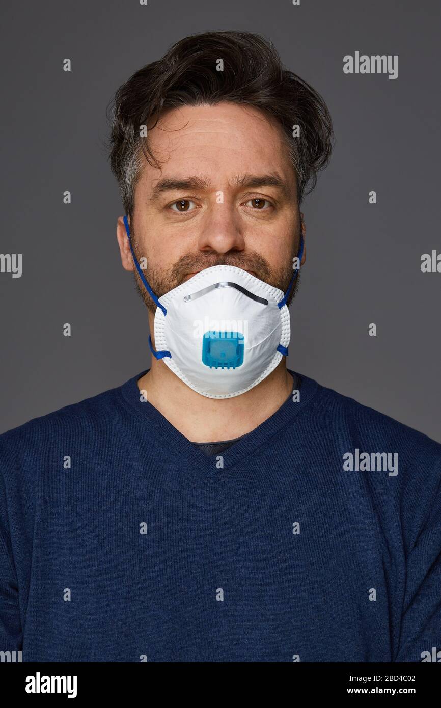 Man with a mask. Use mask properly Stock Photo Alamy