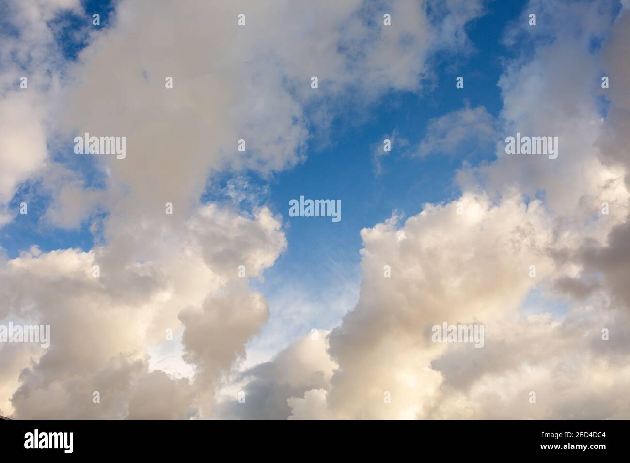 White clouds against blue sky background Stock Photo