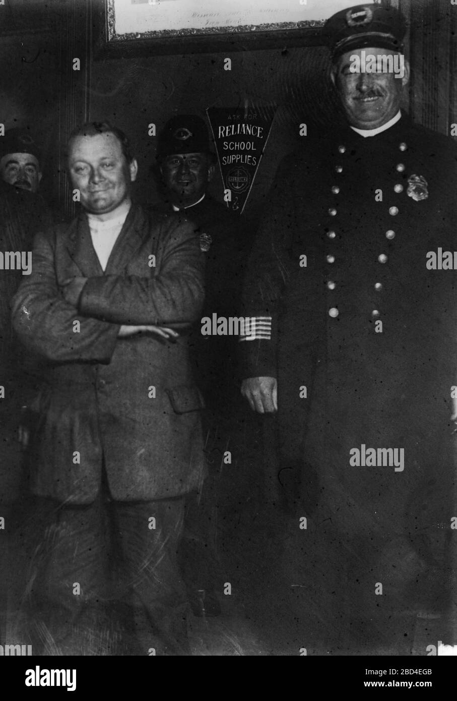 John F. Schrank in police custody after his attempted assassination of U.S. President Teddy Roosevelt in Oct. 1912 Stock Photo