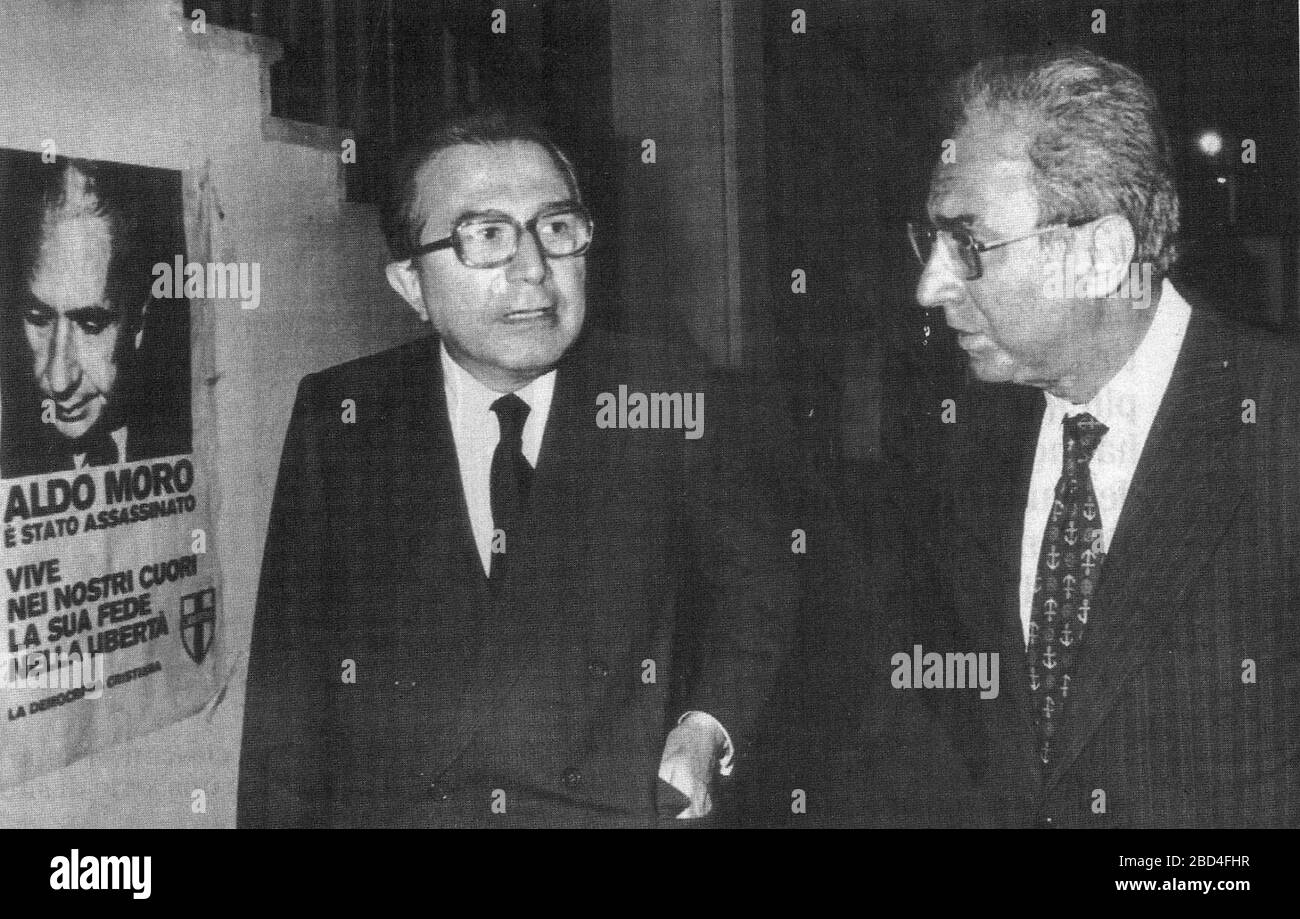 Italian politicans Giulio Andreotti and Francesco Cossiga (after 1978 - per poster of assasinated Aldo Moro poster in background) Stock Photo
