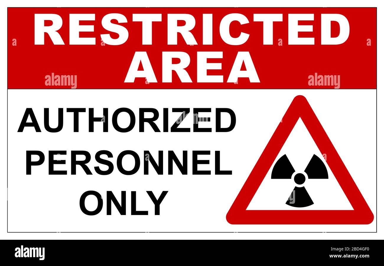 Restricted area sign with radiation warning Stock Photo