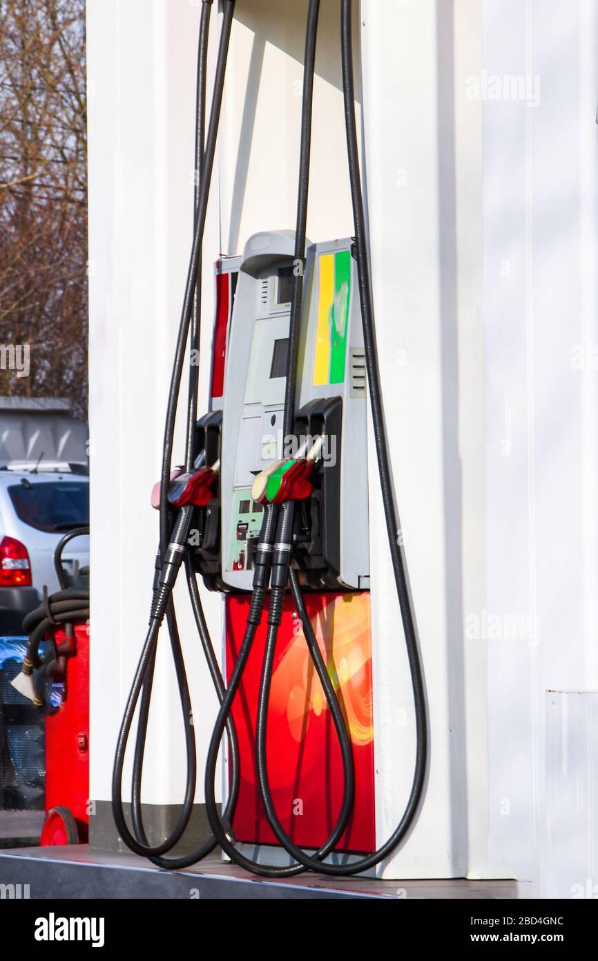 Handle fuel nozzle to refuel, fuel oil gasoline dispenser at petrol