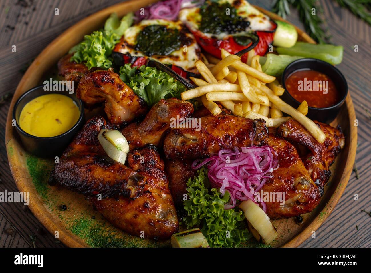 Fried chicken wings and French fries. Menu Stock Photo Alamy
