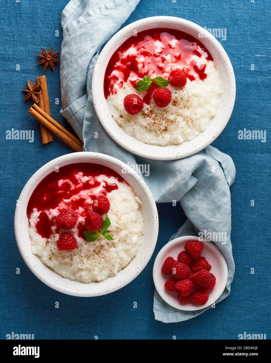 Rice pudding. French milk rice dessert with raspberries, blueberries