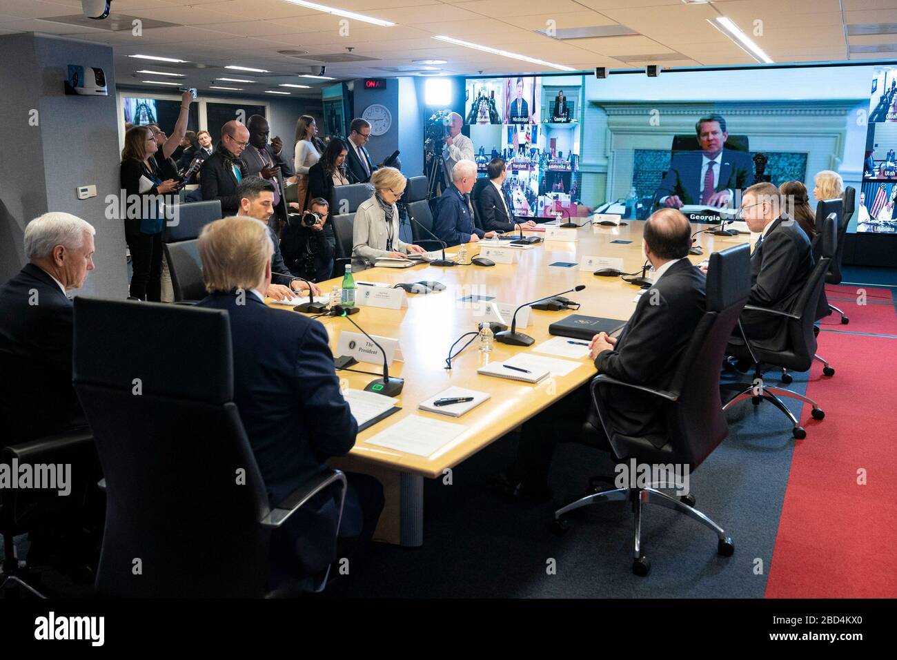 President Donald J. Trump, joined by Vice President Mike Pence and members of the White House Coronavirus Task Force, participates in a teleconference with Governors at the Federal Emergency Management Center Headquarters in Washington, D.C. Thursday, March 19, 2020, to discuss partnership to prepare, mitigate and respond to the COVID-19 Coronavirus. Stock Photo