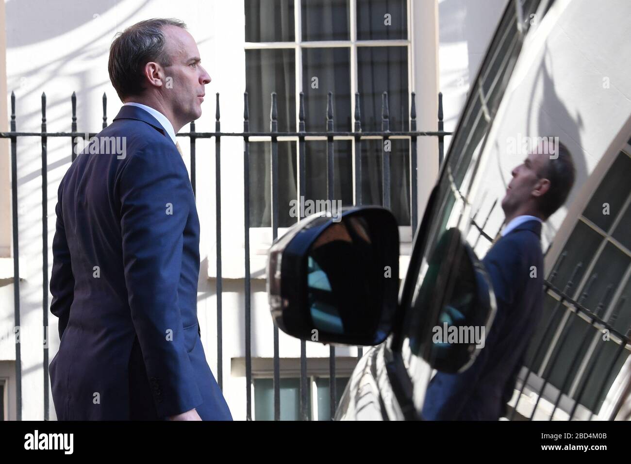 Foreign Secretary Dominic Raab, who is taking charge of the Government's response to the coronavirus crisis after Prime Minister Boris Johnson was admitted to intensive care Monday, arrives at 10 Downing Street, London. Stock Photo