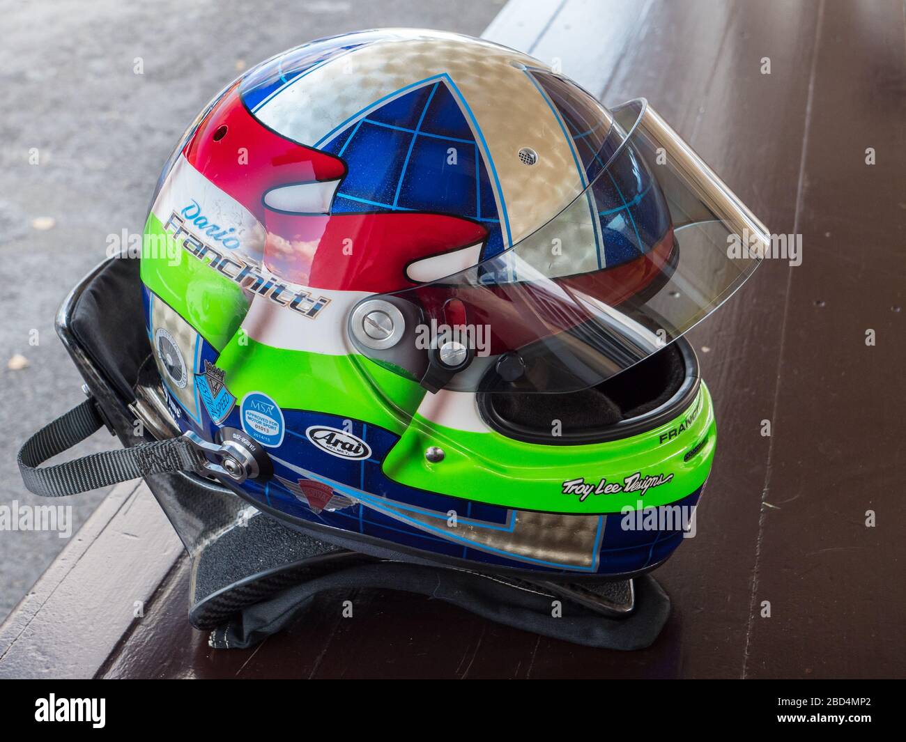 Colourful crash helmet of racing driver Dario Franchitti, Goodwood Revival 2019 West Sussex UK Stock Photo