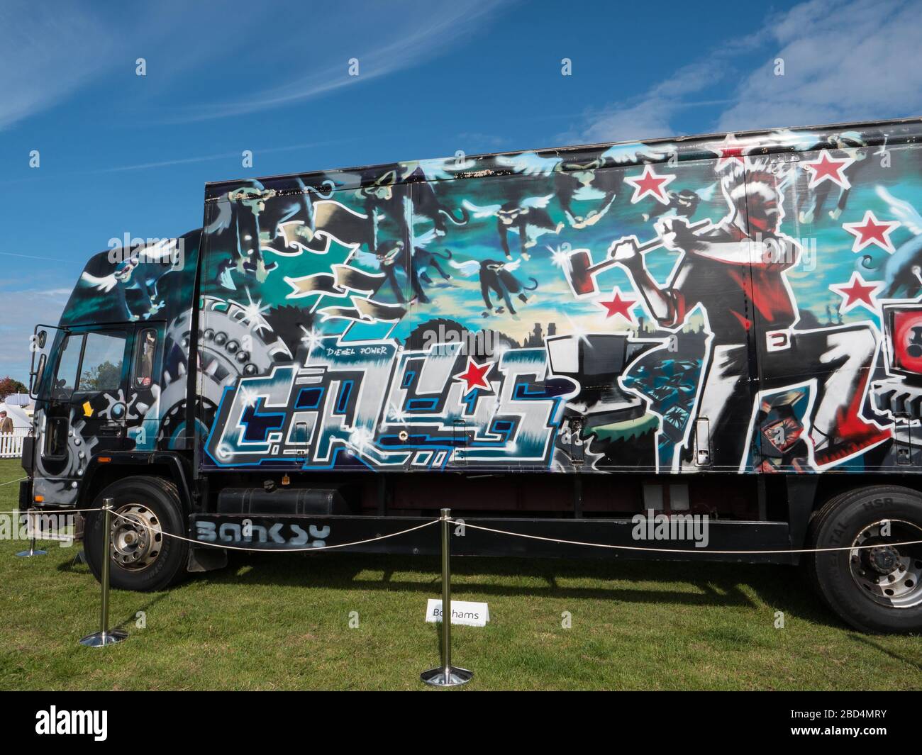Graffiticovered Banksy artwork on a truck, Goodwood Revival, West