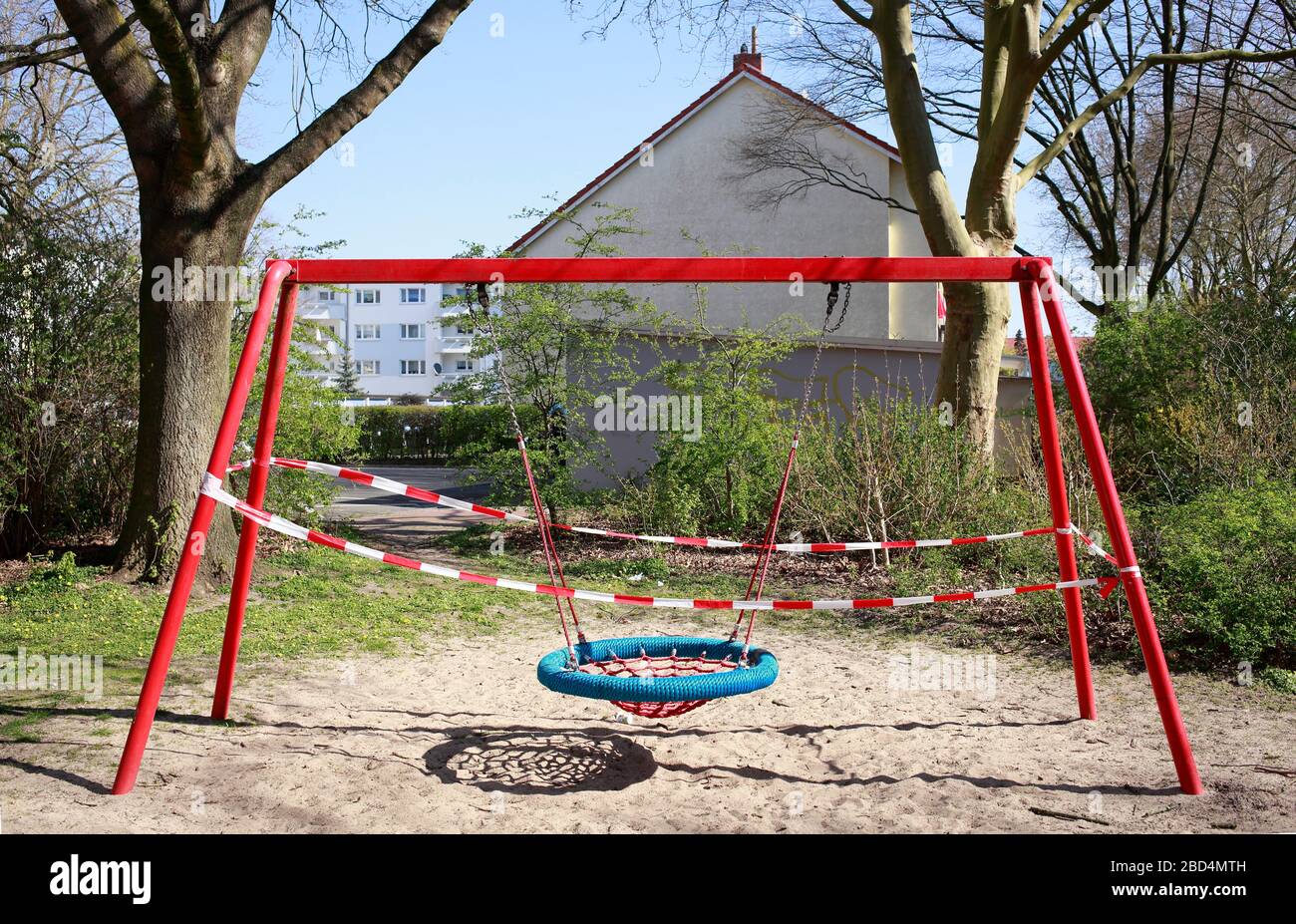 Empty playground, closed due to corona virus, forbidden to enter, Germany, Europe Stock Photo