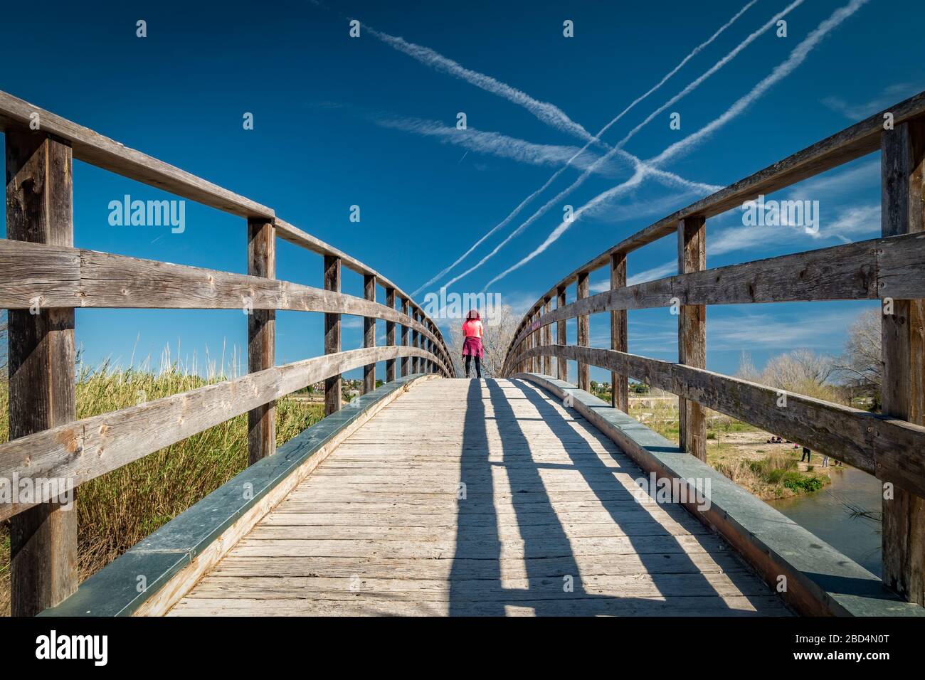 Woman in pink clothes hi-res stock photography and images - Alamy