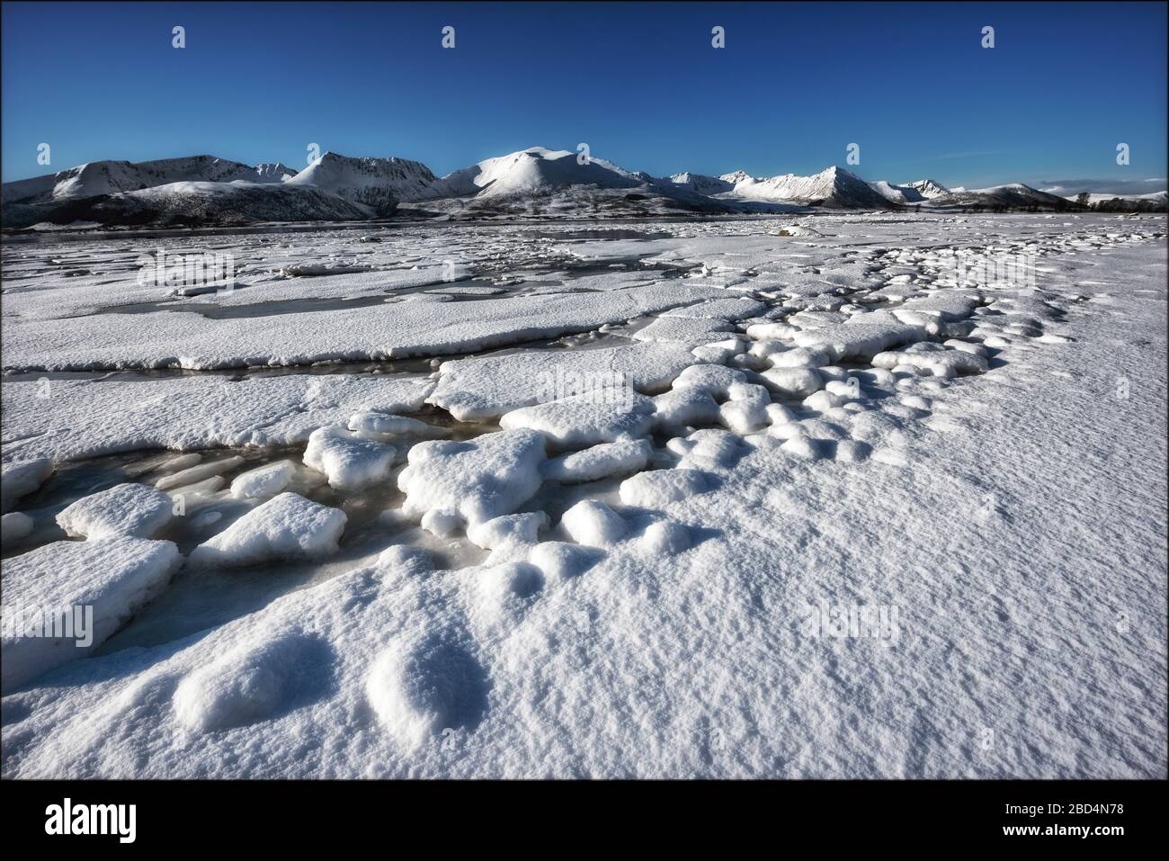 Land - water transition under snow and ice. Norway Stock Photo