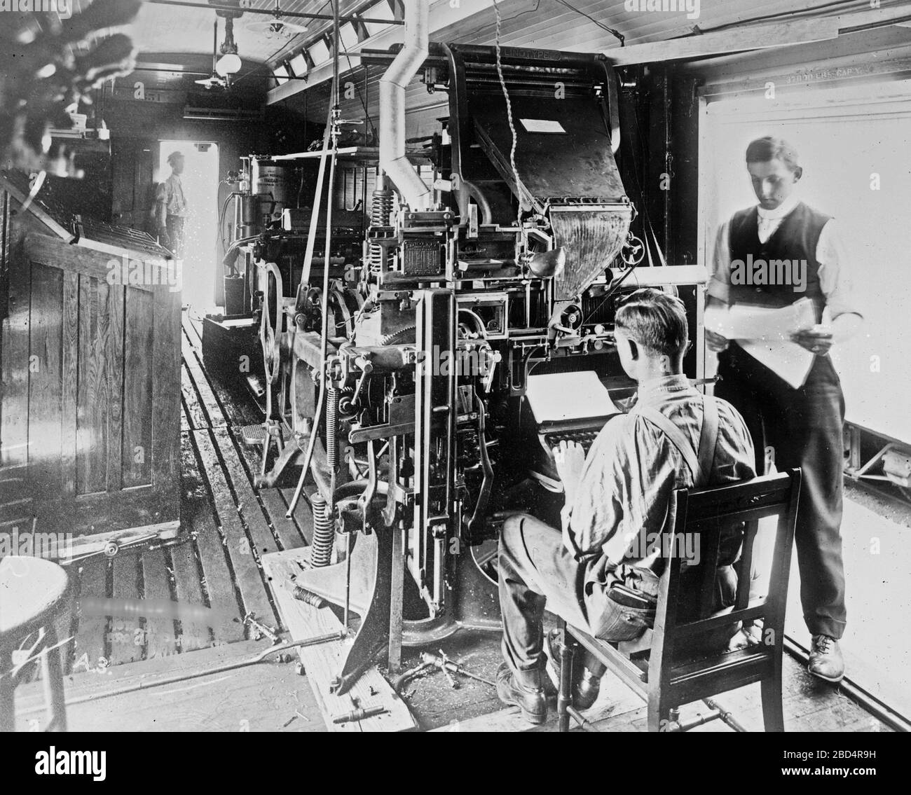 Linotype on press car on the Great Northern Railway ca. July 1913 Stock Photo