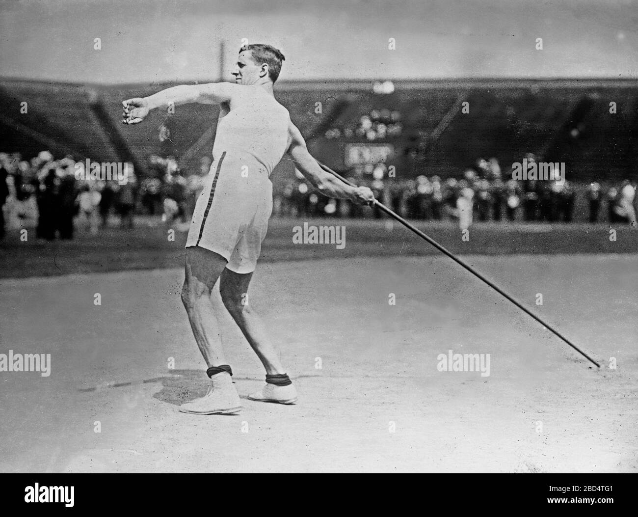 Olympic track and field athlete Platt Adams participating in a javelin throw event ca. 19101915