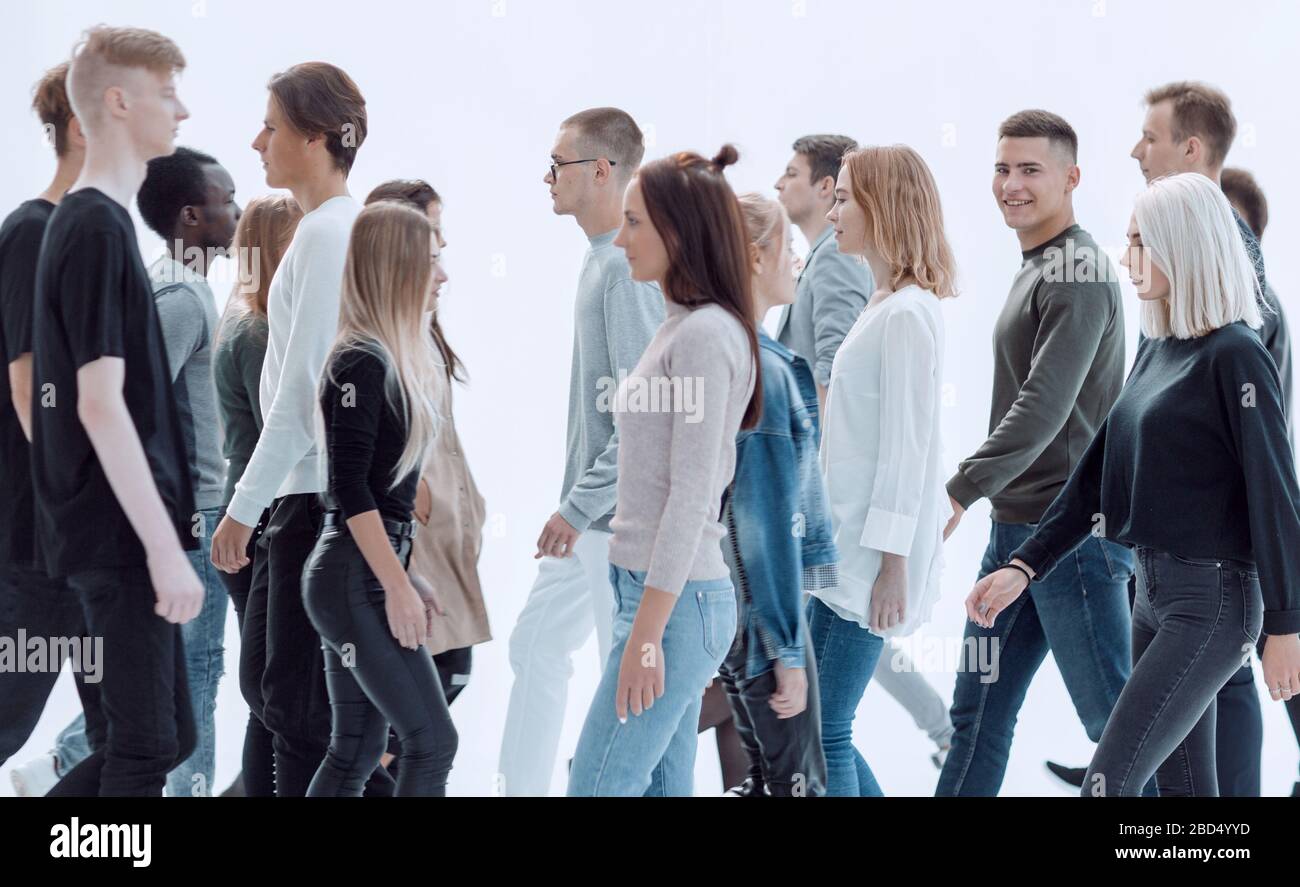 casual young people passing by each other Stock Photo
