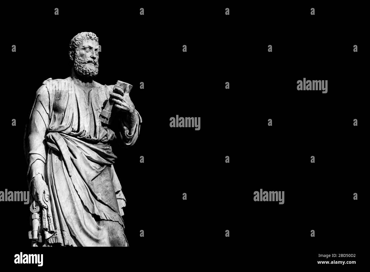 Saint Peter holding the key of heaven statue on Holy Angel Bridge in Rome, made in the 17th century by sculptor Lorenzetto (Black and White with copy Stock Photo