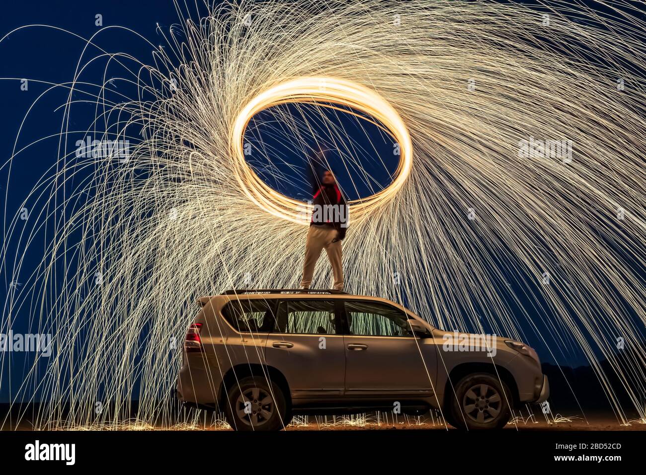 A steel wool on fire at night (night photography using a slow shutter speed) selective focused