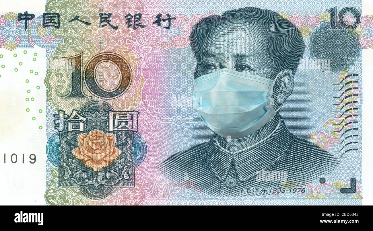 Mao Zedong portrait from 10 Chinese Yuan banknote wearing protective mask Stock Photo