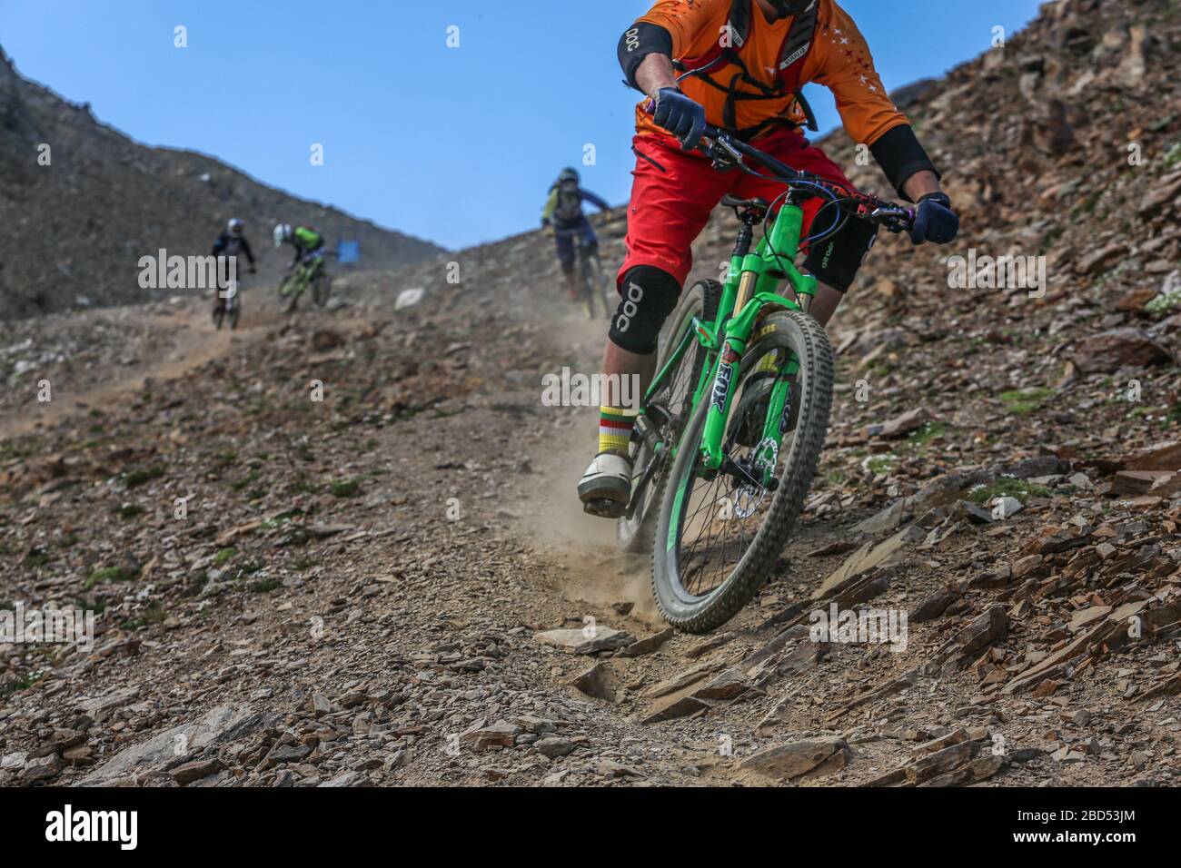 mountain biker in a downhill race Stock Photo