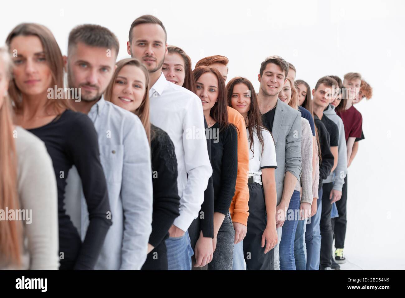 group of diverse young people standing in line Stock Photo - Alamy